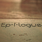 the word epilogue on top of wood